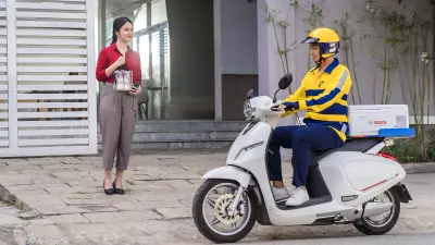 Milky Way smart box mounted on a Vinfast scooter.